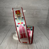 2.5"X10YD PASTEL NUTCRACKER ON SATIN RIBBON - PINK/BLUE/RED - DCR5731